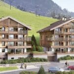 Alpine chalets with balconies in mountainous landscape.