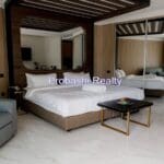 Modern hotel room with mirrored walls.