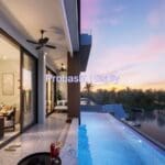 Luxury villa with pool and sunset view.