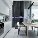 Modern kitchen and dining area with table.