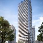 Modern skyscraper with glass facade and trees.