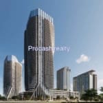 Modern skyscrapers under clear blue sky.