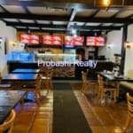 Cozy restaurant interior with wooden furniture.