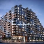 Modern multi-story building at dusk.